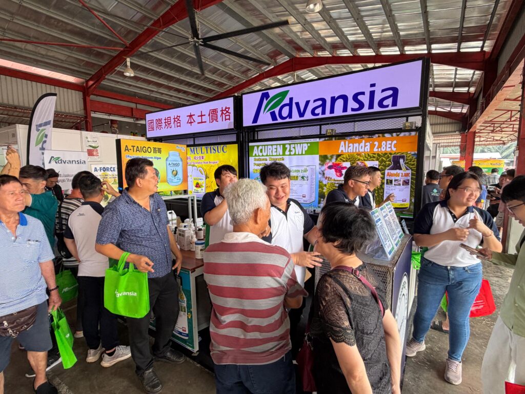 Advansia representative sharing agricultural solutions with visitors at the AgTech exhibition in Raub